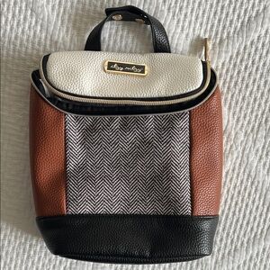 Itzi Ritzy Black, Brown, and White Herringbone Backpack for baby diapers.